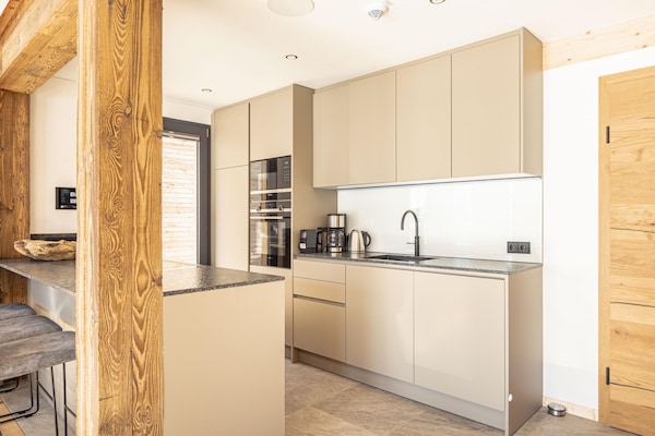 Foto van Vakantiehuis met sauna en zwembad (zonder borg) - Vakantiehuis in Sankt Georgen am Kreischberg - Kitchen