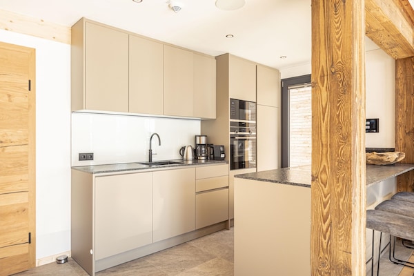 Foto van Vakantiehuis met sauna en zwembad (zonder borg) - Vakantiehuis in Sankt Georgen am Kreischberg - Kitchen
