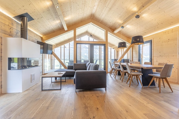 Foto van Chalet met warm zwembad op terras - Vakantiehuis in Ennsling - LivingRoom