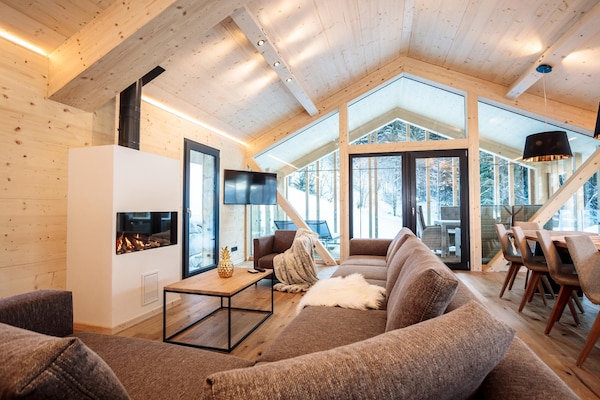 Foto van Chalet met warm zwembad op terras - Vakantiehuis in Ennsling - LivingRoom