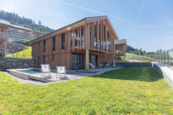 Foto van Chalet met warm zwembad op terras - Vakantiehuis in Ennsling - ExteriorSummer
