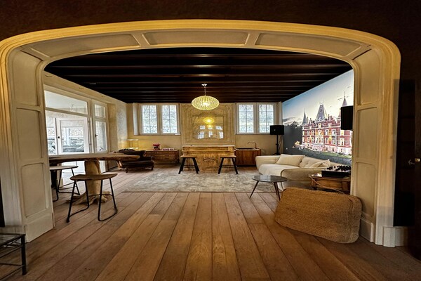 Foto van Luxe villa met verwarmd zwembad - Vakantiehuis in Faulx-les-Tom - LivingRoom