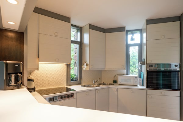 Foto van Vrijstaande vakantiewoning in de Ardennen met biozwembad - Kitchen