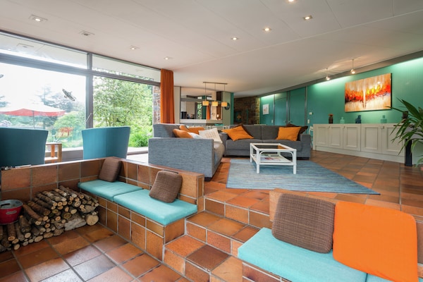 Foto van Vrijstaande vakantiewoning in de Ardennen met biozwembad - LivingRoom