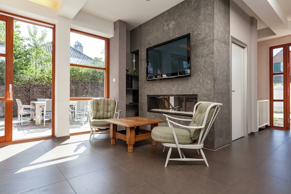Foto van Villaverblijf met zwembad en sauna - Vakantiehuis in Koksijde - LivingRoom