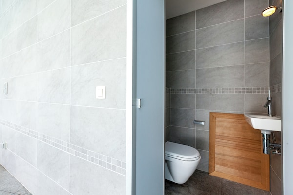 Foto van Villaverblijf met zwembad en sauna - Vakantiehuis in Koksijde - BathRoom