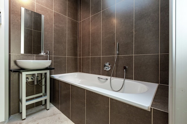 Foto van Villaverblijf met zwembad en sauna - Vakantiehuis in Koksijde - BathRoom