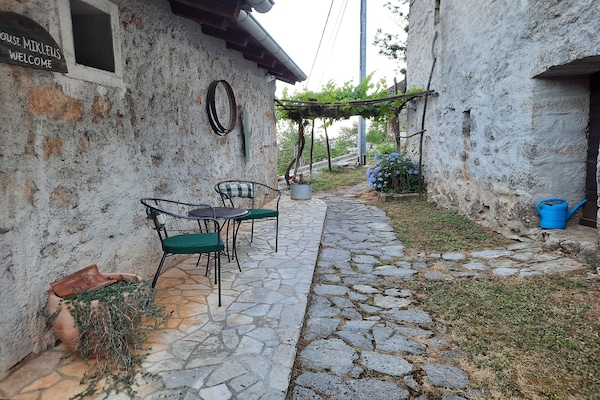 Foto van Stenen huis in Dobrec met zeezicht & zwembad - Vakantiehuis in Lovran - Outdoor