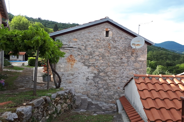 Foto van Stenen huis in Dobrec met zeezicht & zwembad - Vakantiehuis in Lovran - Outdoor