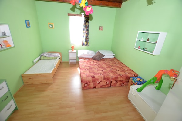 Foto van Bosontsnapping met tuin - Vakantiehuis in Staré Křečany - BedRoom