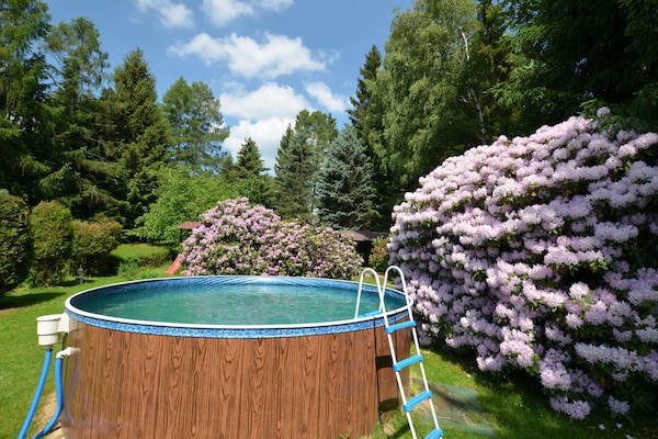 Foto van Bosontsnapping met tuin - Vakantiehuis in Staré Křečany - PoolOfHouse