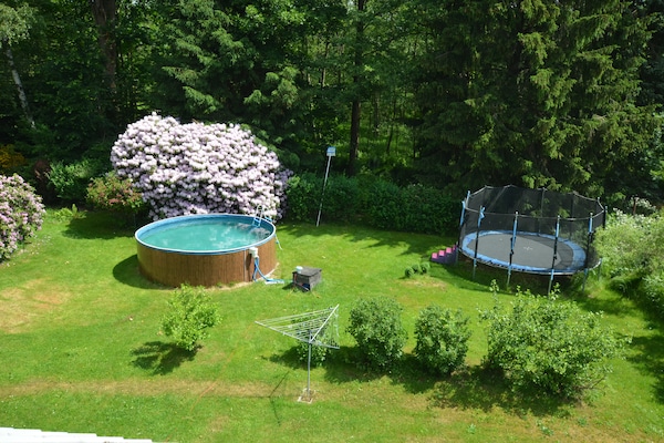 Foto van Bosontsnapping met tuin - Vakantiehuis in Staré Křečany - GardenSummer
