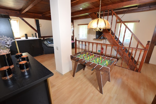 Foto van Bosontsnapping met tuin - Vakantiehuis in Staré Křečany - LivingRoom
