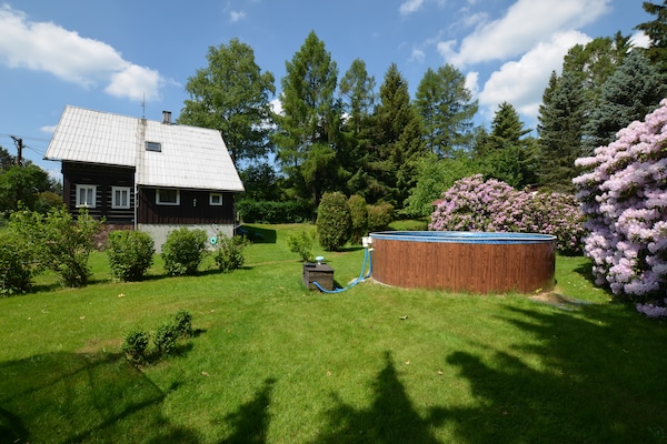 Foto van Bosontsnapping met tuin - Vakantiehuis in Staré Křečany - ExteriorSummer