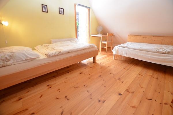 Foto van Vakantiehuis in bos met privézwembad - Vakantiehuis in Petrohrad - BedRoom