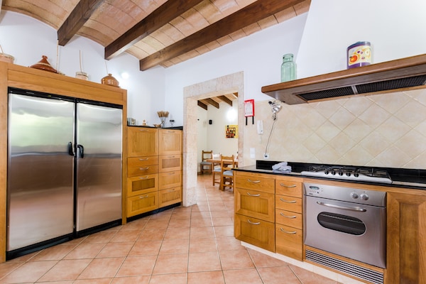 Foto van Villa met terraszicht - Vakantiehuis in Búger , Illes Balears - Kitchen