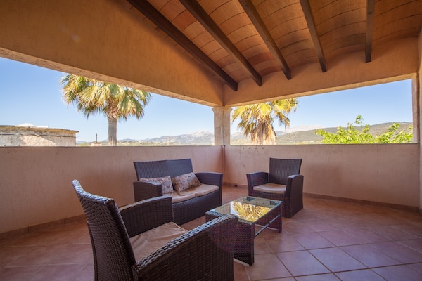 Foto van Villa met terraszicht - Vakantiehuis in Búger , Illes Balears - TerraceBalcony