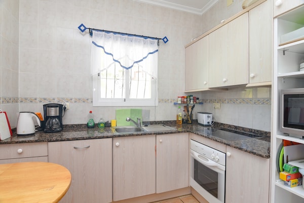 Foto van ﻿Vrijstaande villa aan de kust in Benitachell met zwembad - Kitchen