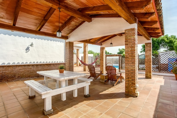 Foto van Familievilla met zwembad - Vakantiehuis in Barbate - TerraceBalcony