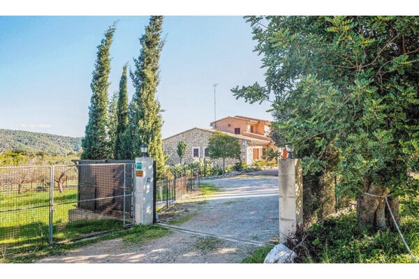 Foto van Landhuis in Spanje met Zwembad & Uitzicht - Vakantiehuis in Campanet - ExteriorSummer