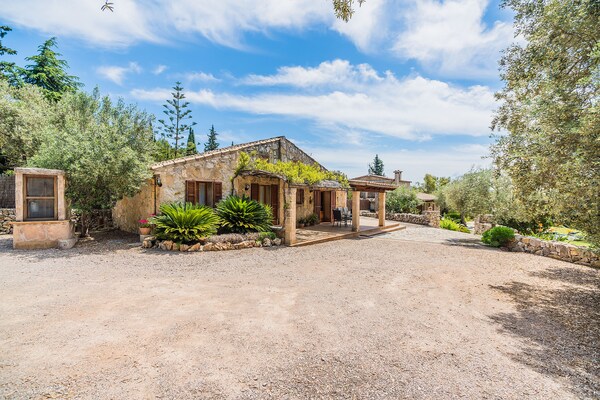 Foto van Rustiek Landhuis voor 4 - Vakantiehuis in Pollensa / Pollença - ExteriorSummer