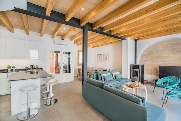 Foto van Rijtjeshuis in de oude binnenstad met zwembad - Vakantiehuis in Pollensa / Pollença - LivingRoom