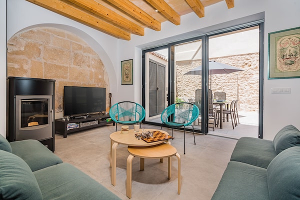 Foto van Rijtjeshuis in de oude binnenstad met zwembad - Vakantiehuis in Pollensa / Pollença - LivingRoom
