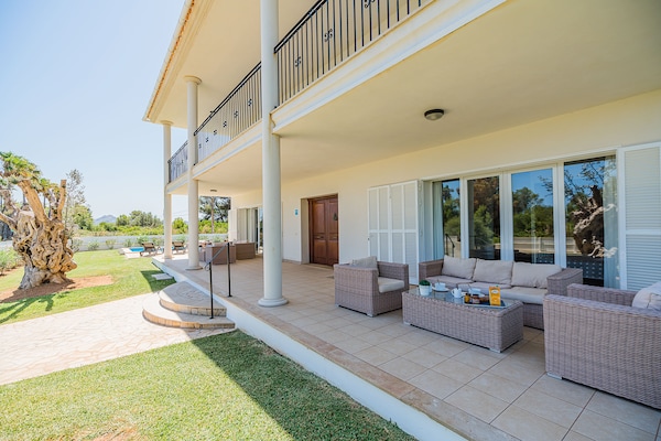 Foto van Villa met zwembad vlakbij het strand op Mallorca - Vakantiehuis in Port de Pollença - TerraceBalcony