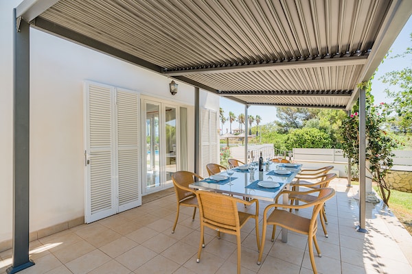 Foto van Villa met zwembad vlakbij het strand op Mallorca - Vakantiehuis in Port de Pollença - TerraceBalcony