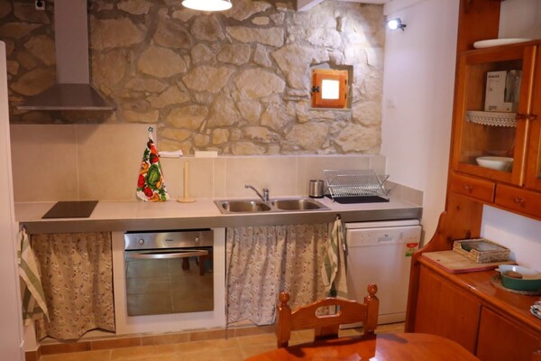 Foto van Vrijstaand landelijk gelegen landhuis de 19e eeuw - Vakantiehuis in Calonge de Segarra - Kitchen