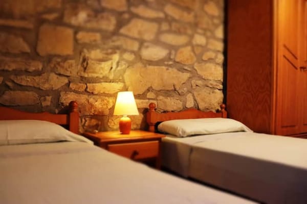 Foto van Vrijstaand landelijk gelegen landhuis de 19e eeuw - Vakantiehuis in Calonge de Segarra - BedRoom