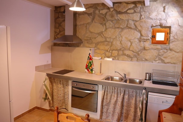 Foto van Vrijstaand landelijk gelegen landhuis de 19e eeuw - Vakantiehuis in Calonge de Segarra - Kitchen