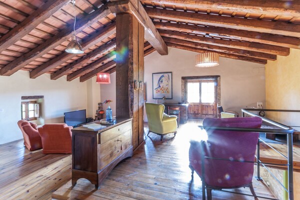 Foto van Landhuis in de buurt van Barcelona met zwembad - Vakantiehuis in Sant Pau de la Guardia - El Bruc - LivingRoom