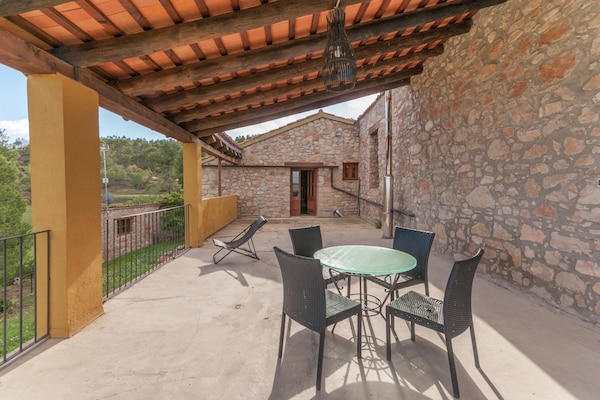 Foto van Landhuis in de buurt van Barcelona met zwembad - Vakantiehuis in Sant Pau de la Guardia - El Bruc - TerraceBalcony