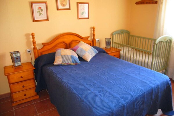 Foto van Villa in Andalusië met prachtig uitzicht - Vakantiehuis in Villanueva de la Concepción - BedRoom