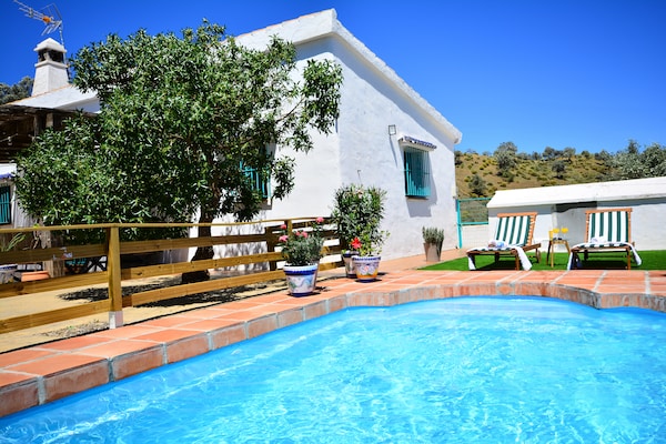 Foto van Villa in Malaga, privézwembad en zeezicht - Vakantiehuis in Cartama - PoolOfHouse