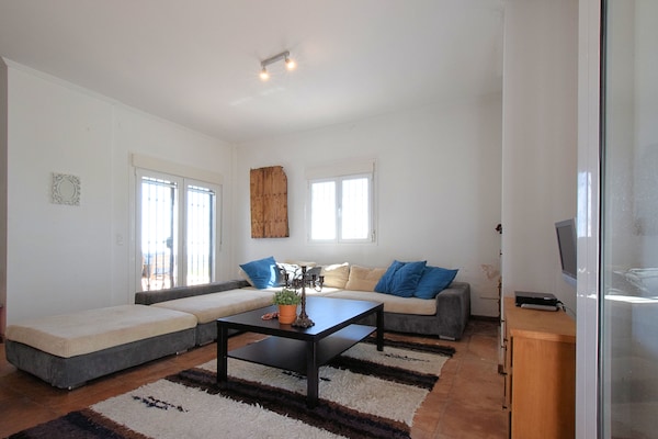 Foto van Villaverblijf met zeezicht - Vakantiehuis in Arenas - LivingRoom
