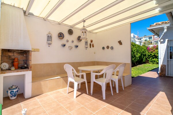 Foto van Villa in Nerja met zwembad bij Burriana Strand - Vakantiehuis in Nerja - terrace