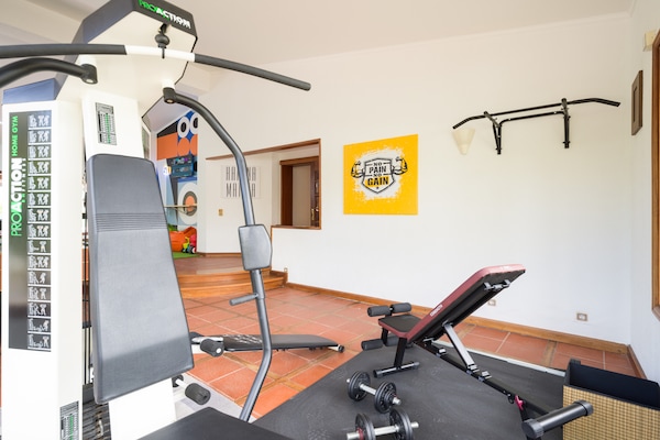 Foto van Chalet in Maspalomas met verwarmd zwembad - Vakantiehuis in San Bartolomé de Tirajana - gym