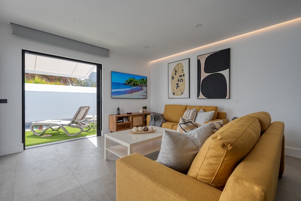 Foto van Chalet in Maspalomas met verwarmd zwembad - Vakantiehuis in San Bartolomé de Tirajana - LivingRoom