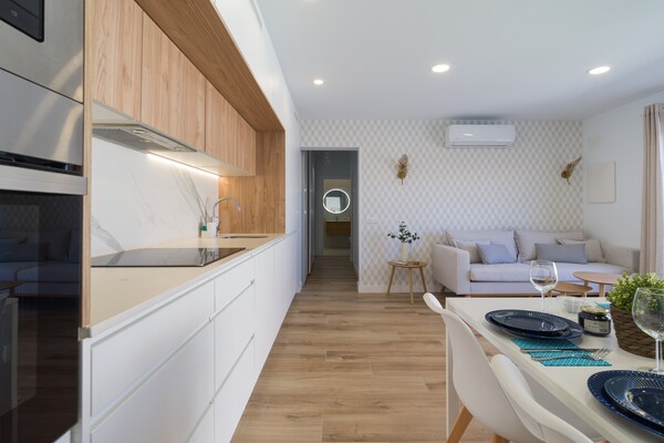 Foto van Bungalow bij Yumbo & Playa del Inglés - Vakantiehuis in San Bartolomé de Tirajana - Kitchen