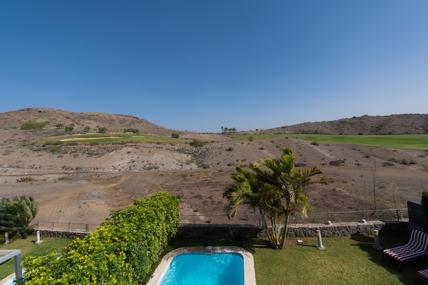 Foto van Villa in Maspalomas met verwarmd zwembad - Vakantiehuis in San Bartolomé de Tirajana - Outdoor