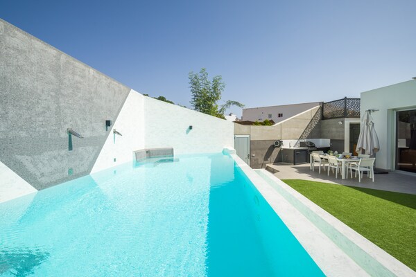 Foto van Villa in Maspalomas met verwarmd privézwembad - Vakantiehuis in San Bartolomé de Tirajana - PoolOfHouse
