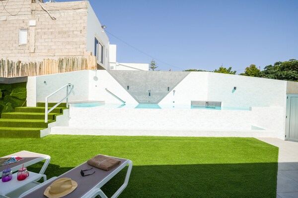 Foto van Villa in Maspalomas met verwarmd privézwembad - Vakantiehuis in San Bartolomé de Tirajana - Outdoor