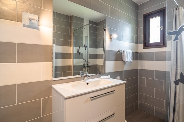 Foto van Villa in Beaufort met Zwembad & Uitzicht - Vakantiehuis in Beaufort - BathRoom