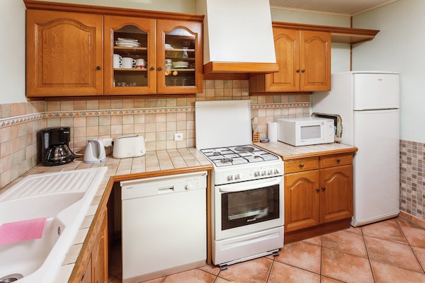 Foto van Rustiek toevluchtsoord voor gezinnen - Vakantiehuis in Loubejac - Kitchen