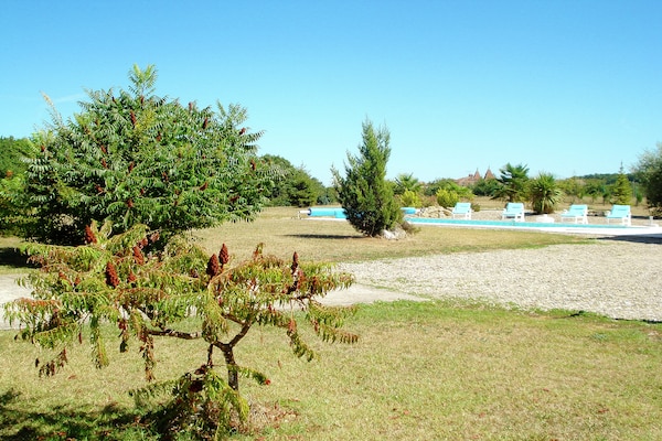 Foto van Panoramische villa aan het zwembad - Vakantiehuis in La Croix-Blanche - PoolOfHouse