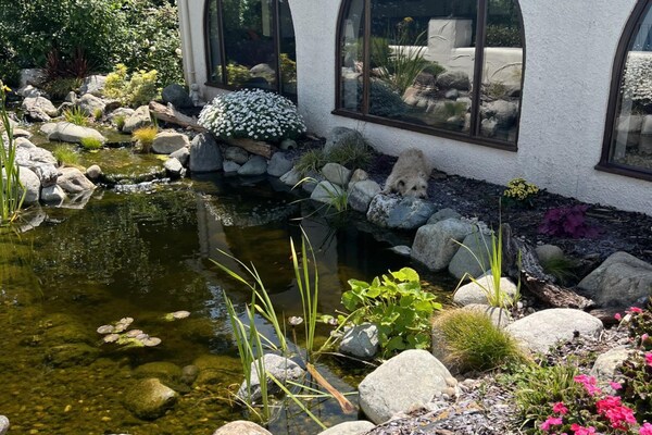 Foto van Landhuis met uitzicht op de oceaan en jacuzzi - Vakantiehuis in Torquay - GardenSummer