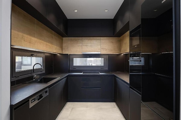 Foto van Villa met zeezicht, zwembad en barbecue voor 8 - Vakantiehuis in Gournes - Kitchen