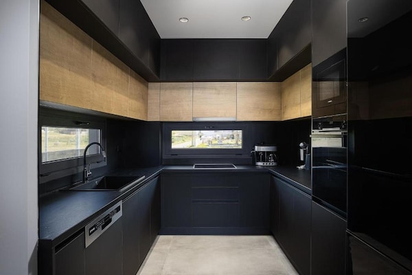 Foto van Villa met zeezicht, zwembad en barbecue voor 8 - Vakantiehuis in Gournes - Kitchen